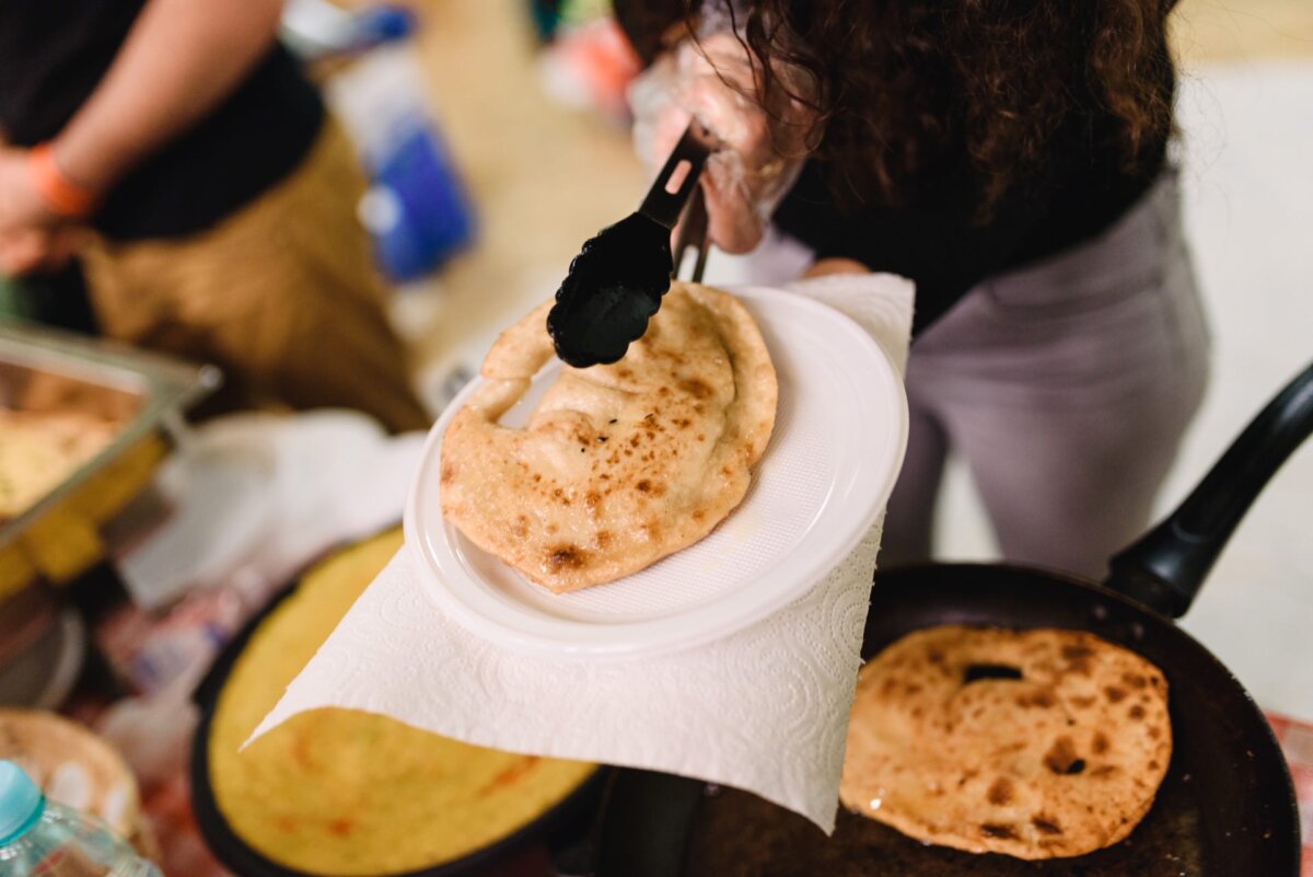 Woman serves dumpling