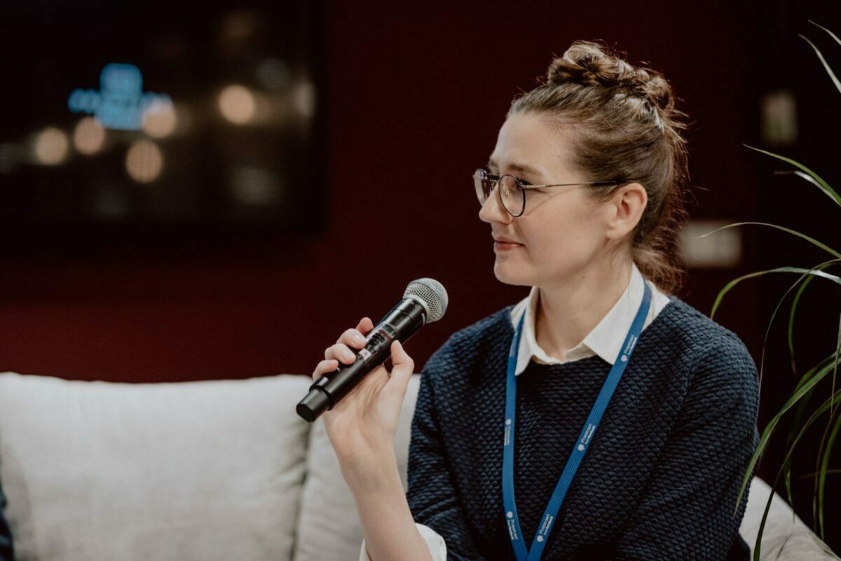 Conference presenter with microphone