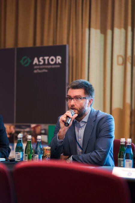 Speaker speaks at the table