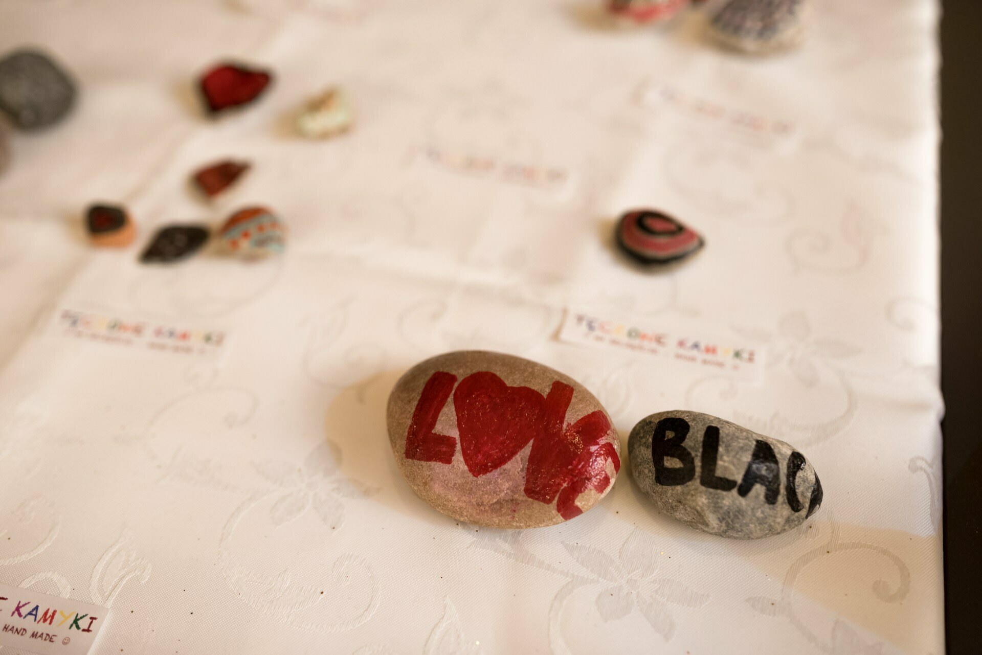 Stone with inscription love and black