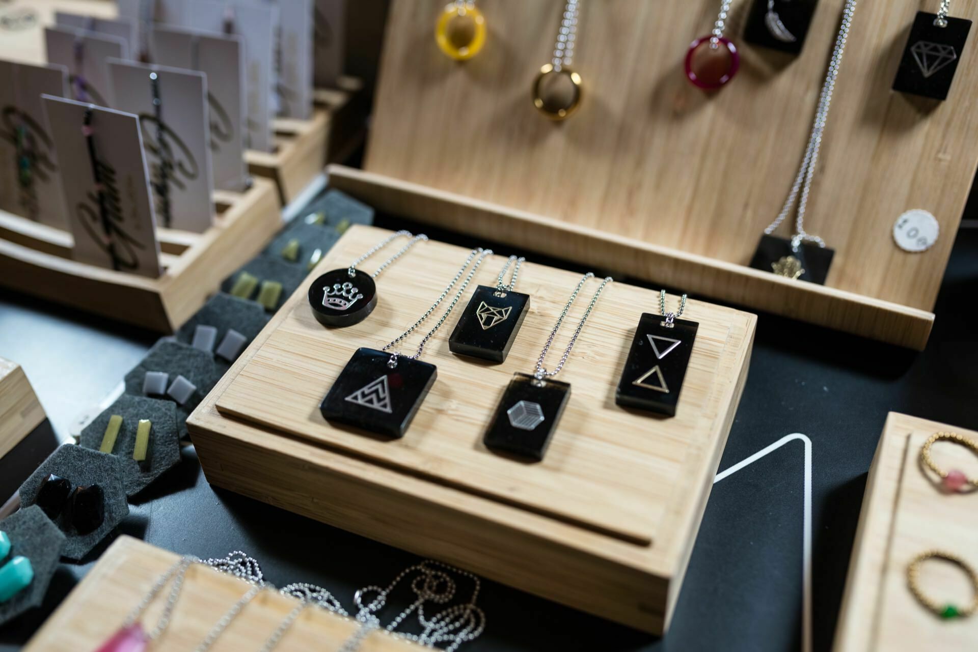 Black pendants with geometric patterns