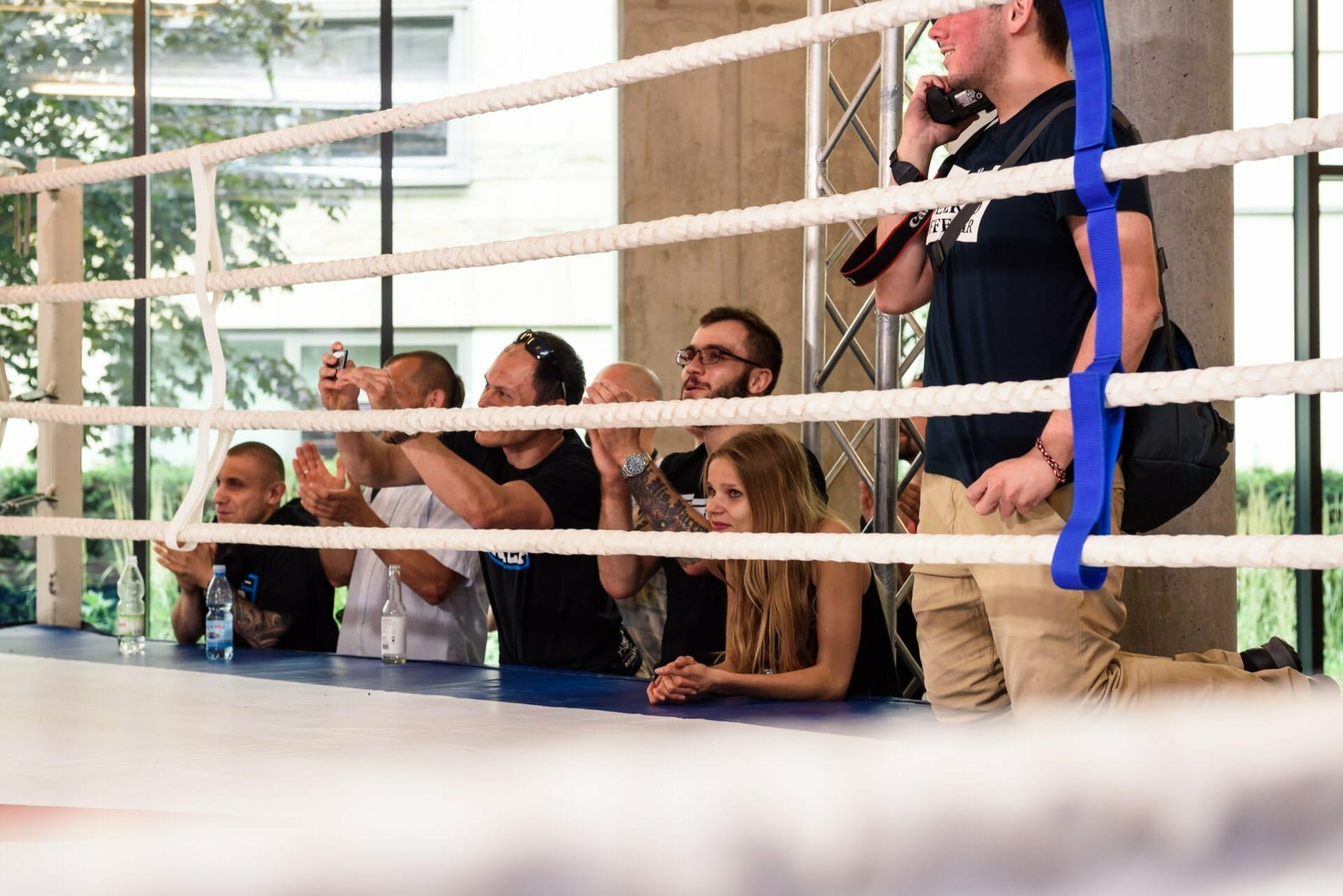 audience looks into the ring