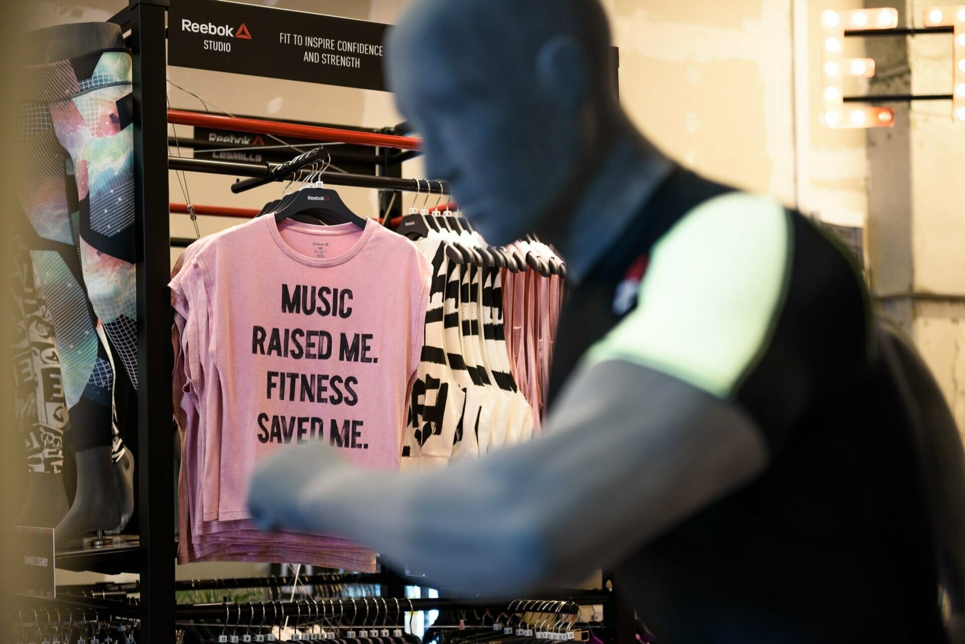 Pink t-shirt with inscription music raised me fitness saved me