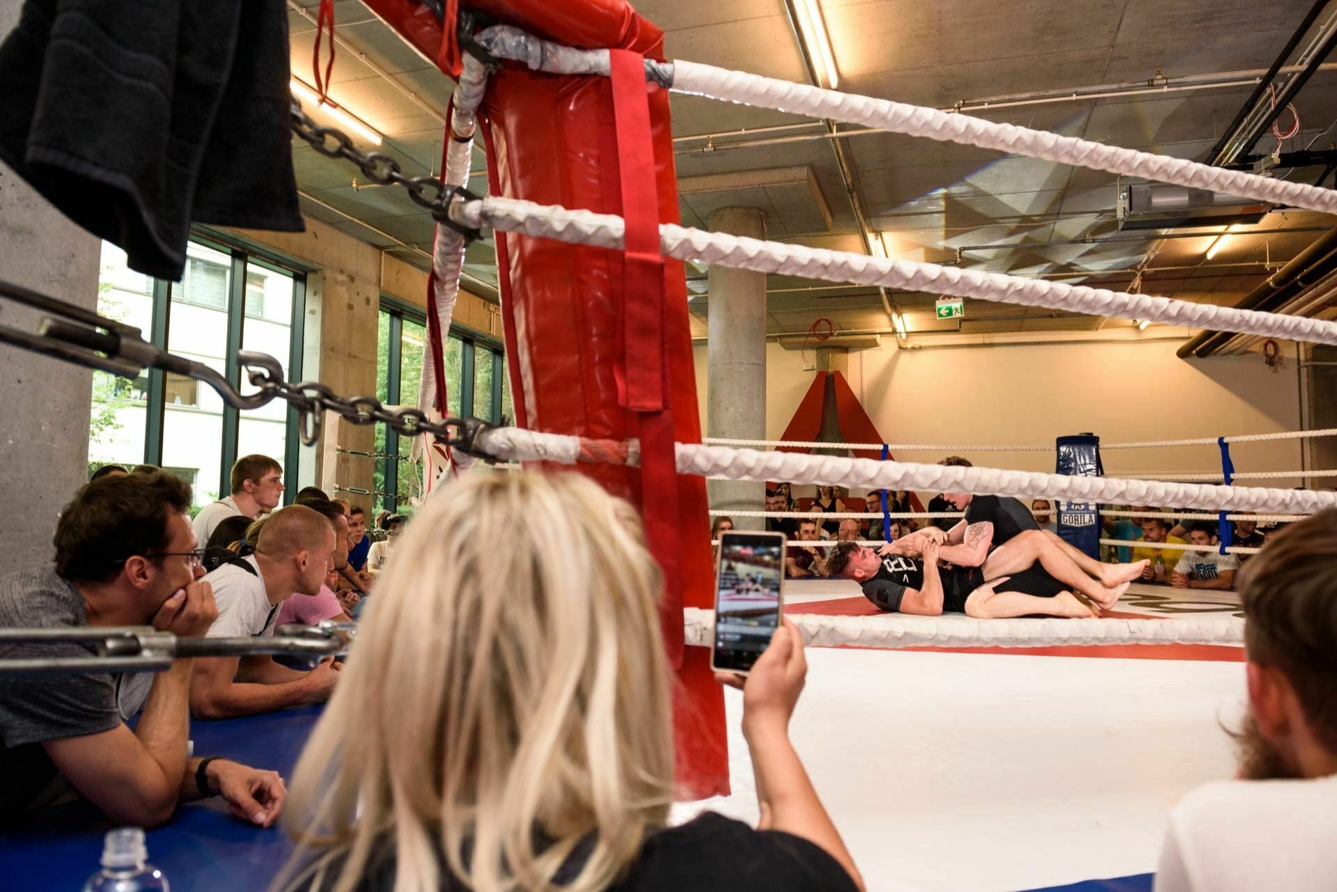 Woman recording the fight with her phone