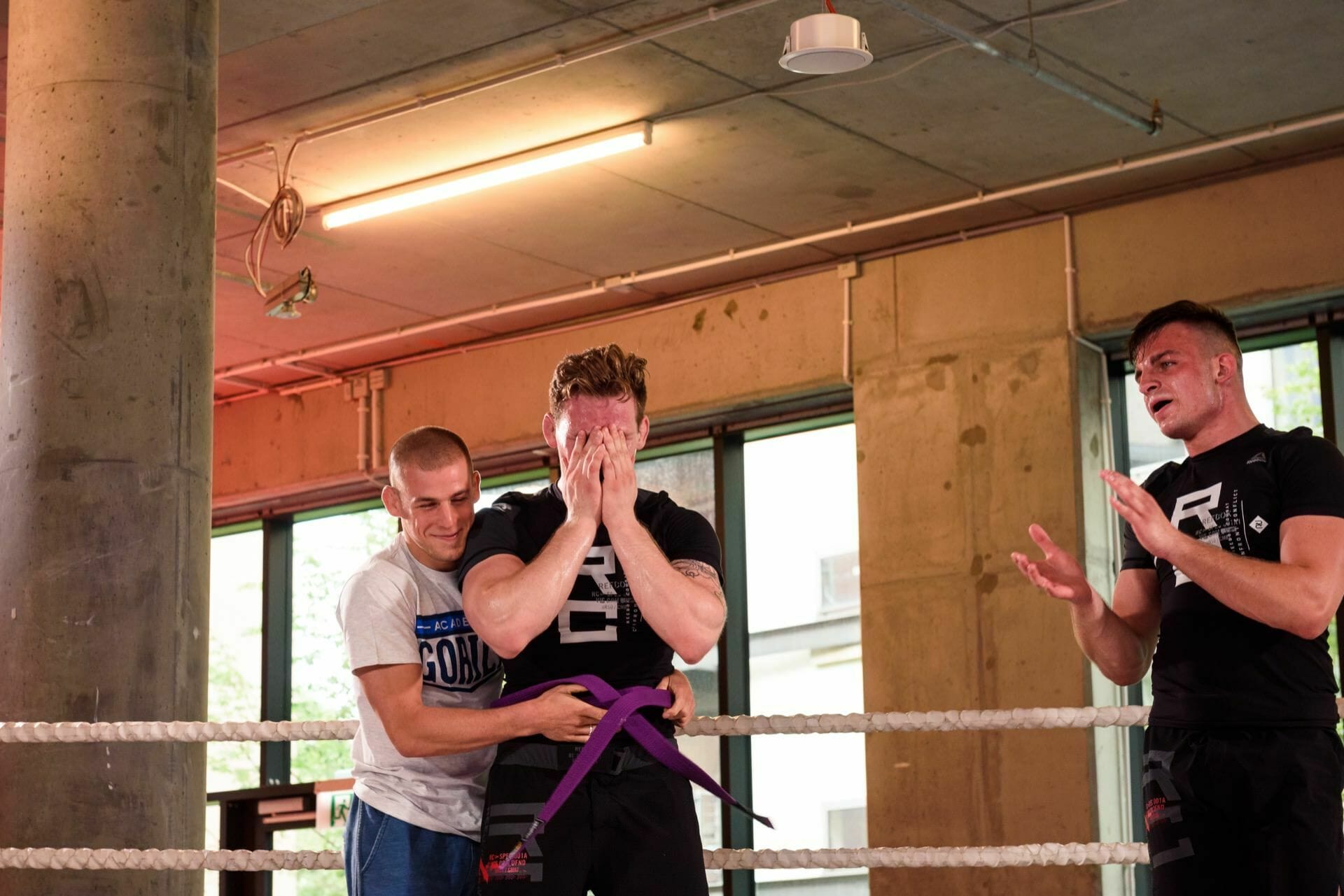 Putting on the purple belt