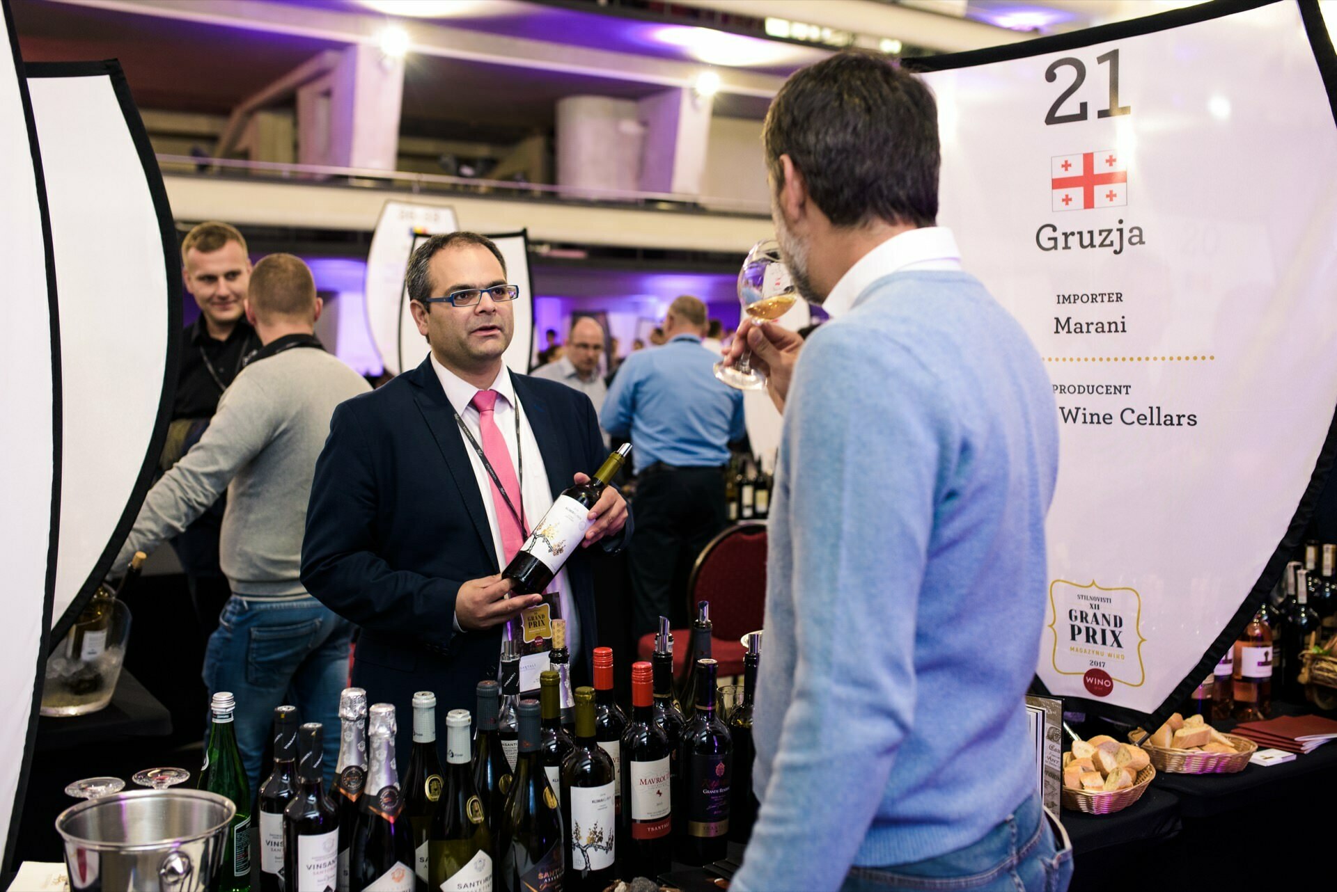 Conversations at a wine stand from Georgia