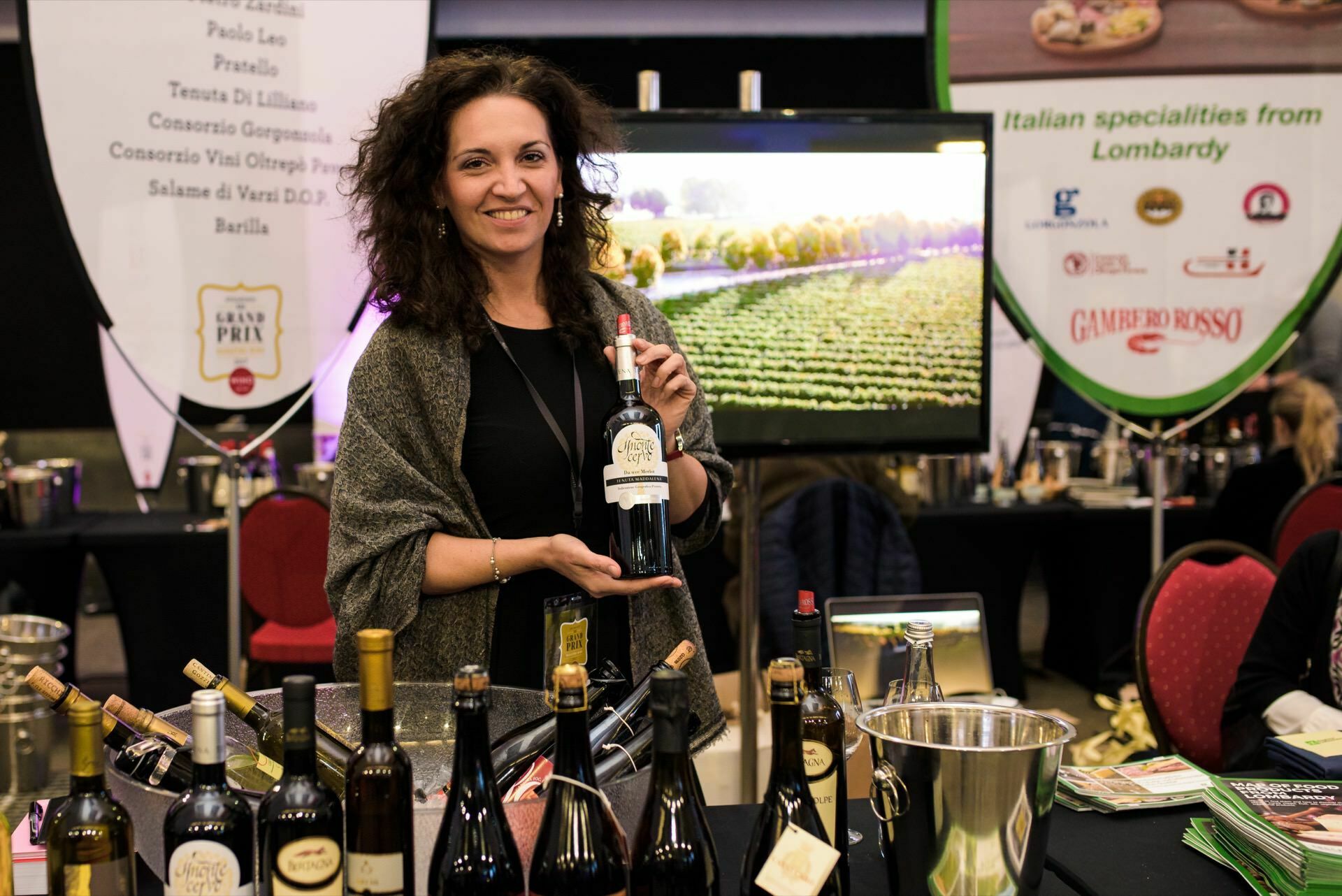 Woman holding a bottle of wine