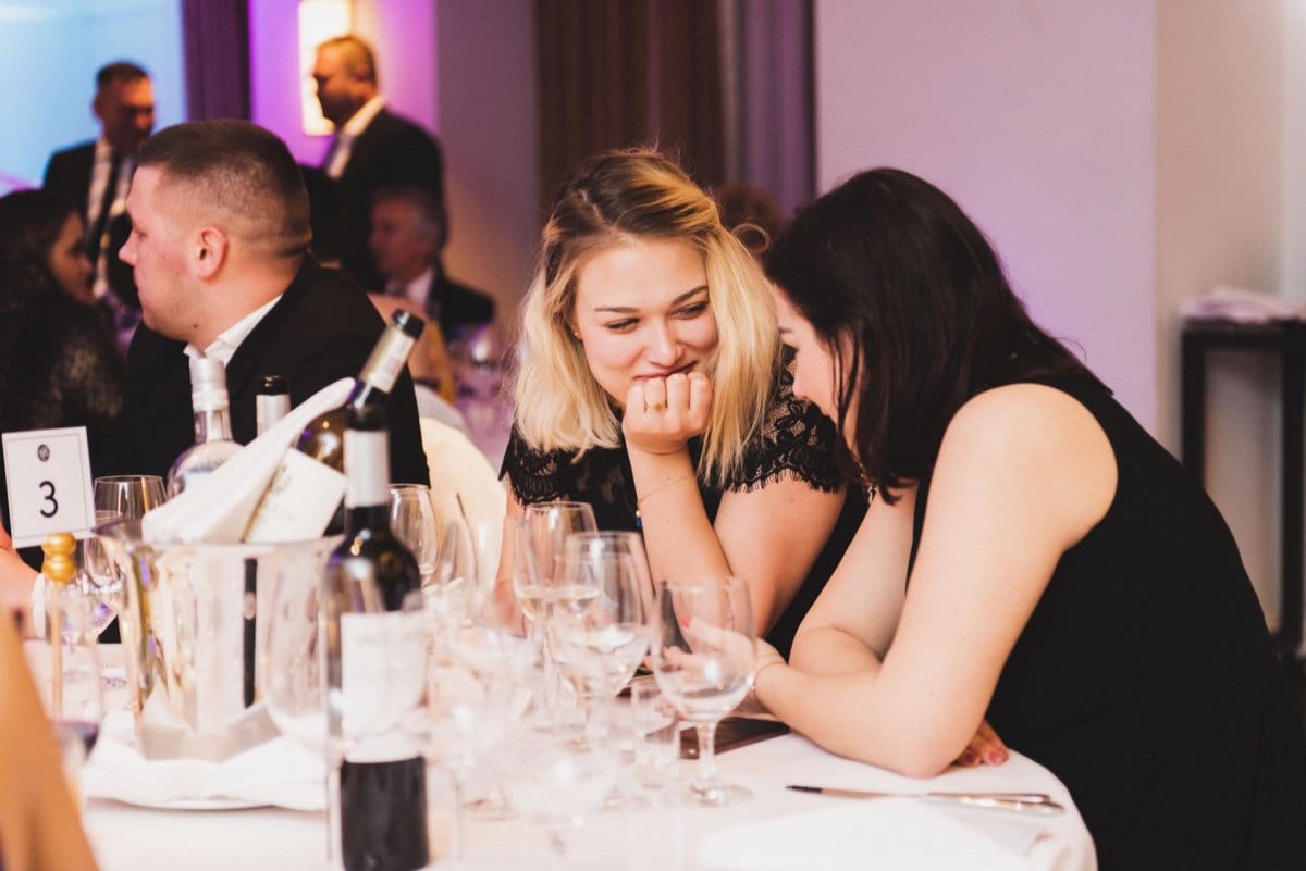 Girls talking at the table