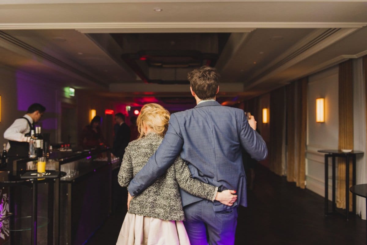 Woman and man walking toward the dance floor