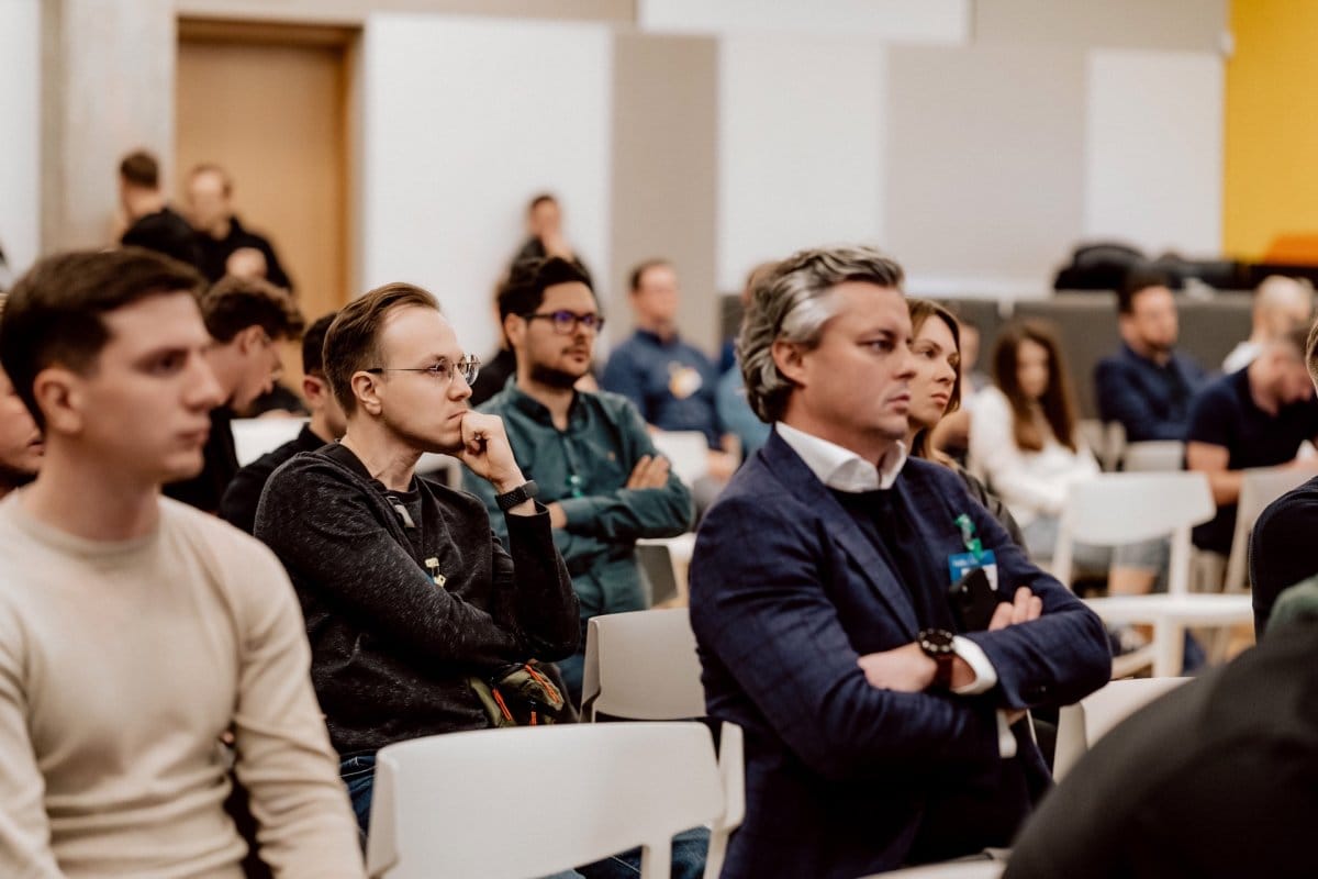 Participants at the Aula Polska conference sit and listen