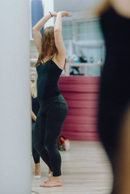 Girl dancing in black leggings