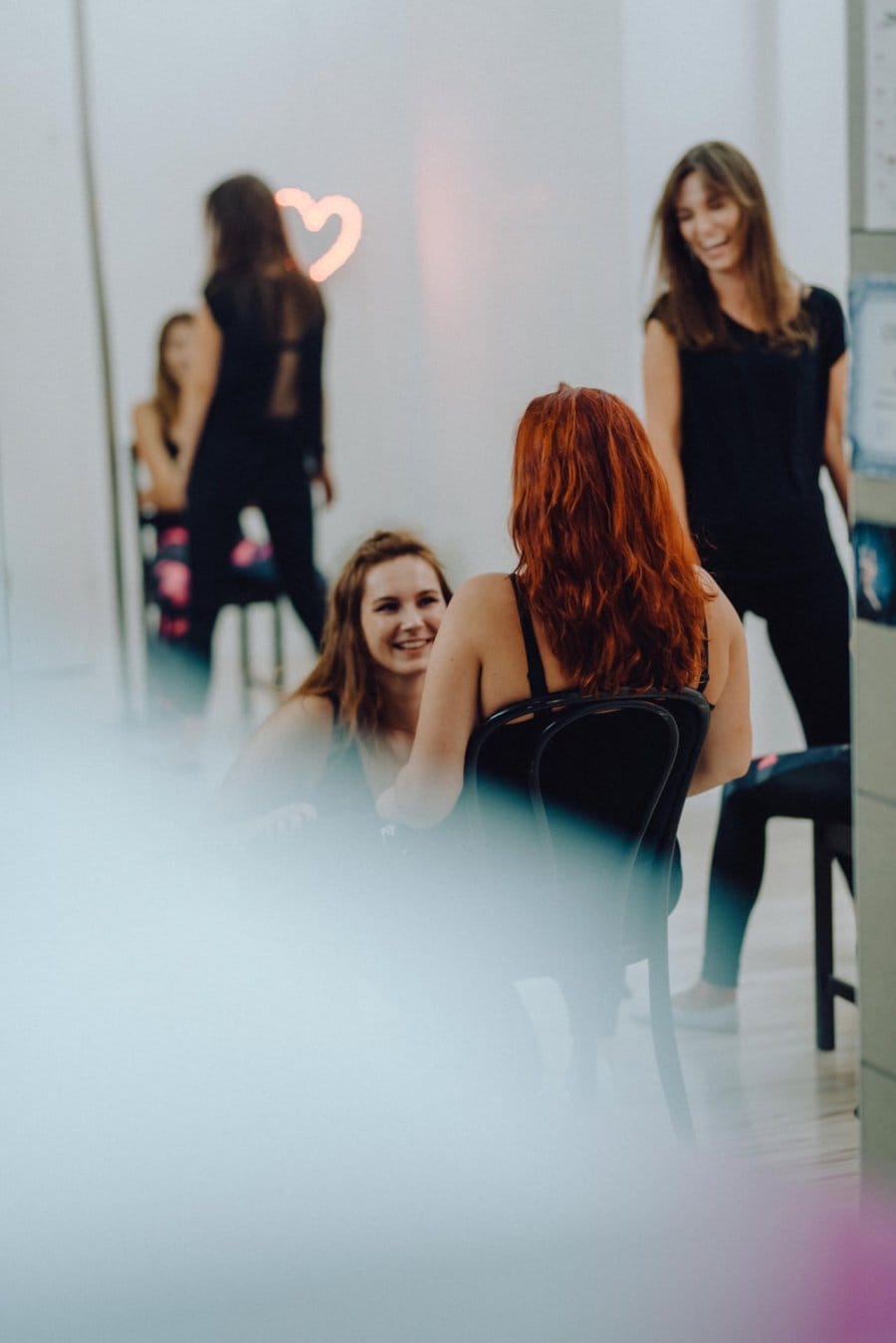 Girls dancing on chairs