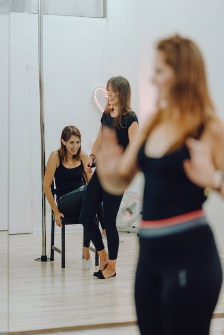 Girls dancing on chairs