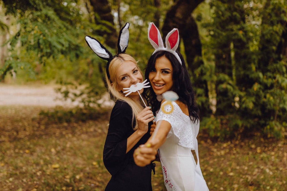 The bride-to-be poses for a photo with her ears and