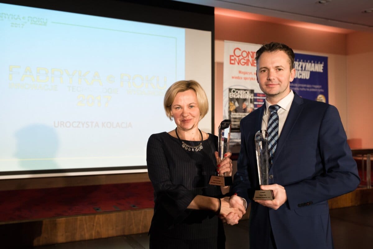 Presentation of glass statuettes on stage