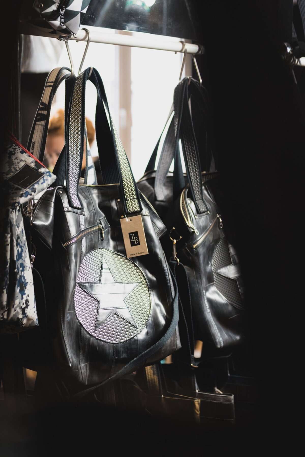 Black bag with a star inscribed in a circle