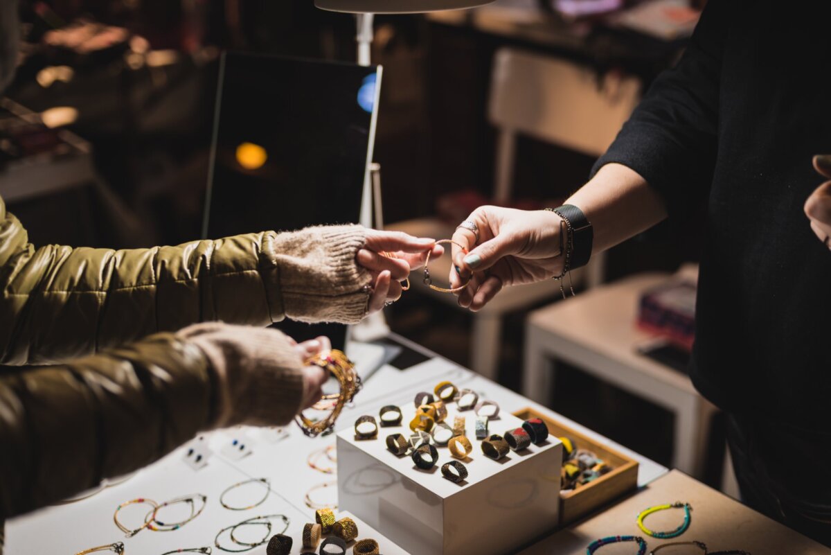 woman's hands hand over bracelet