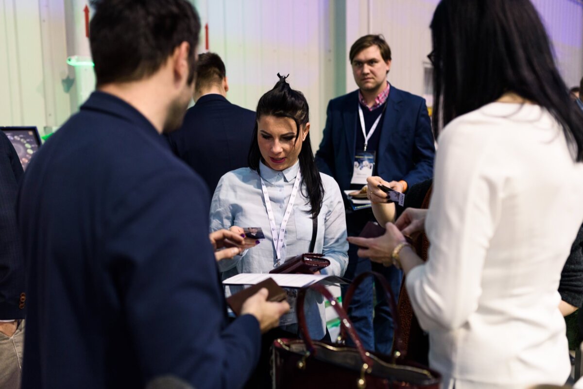 Woman looking at a business card