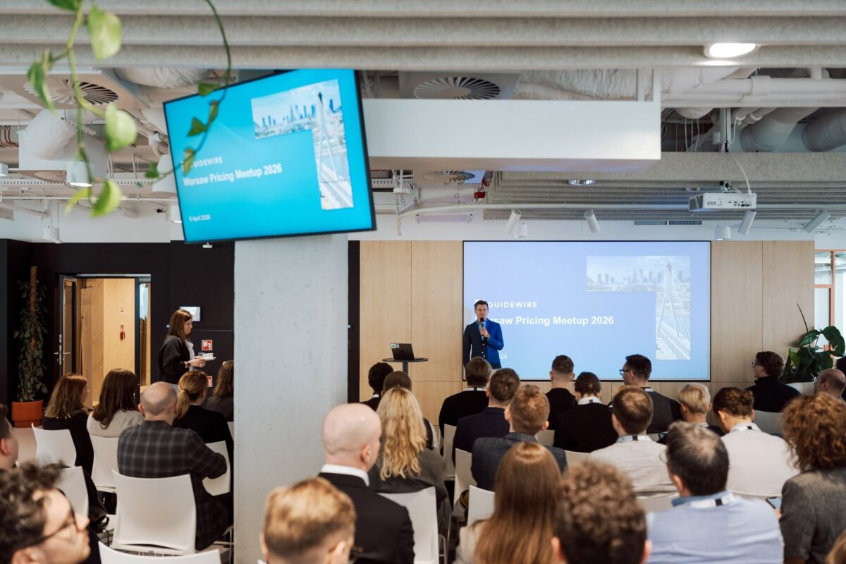 Otwarcie Guidewire Warsaw Pricing Meetup 2026 - podwójny ekran