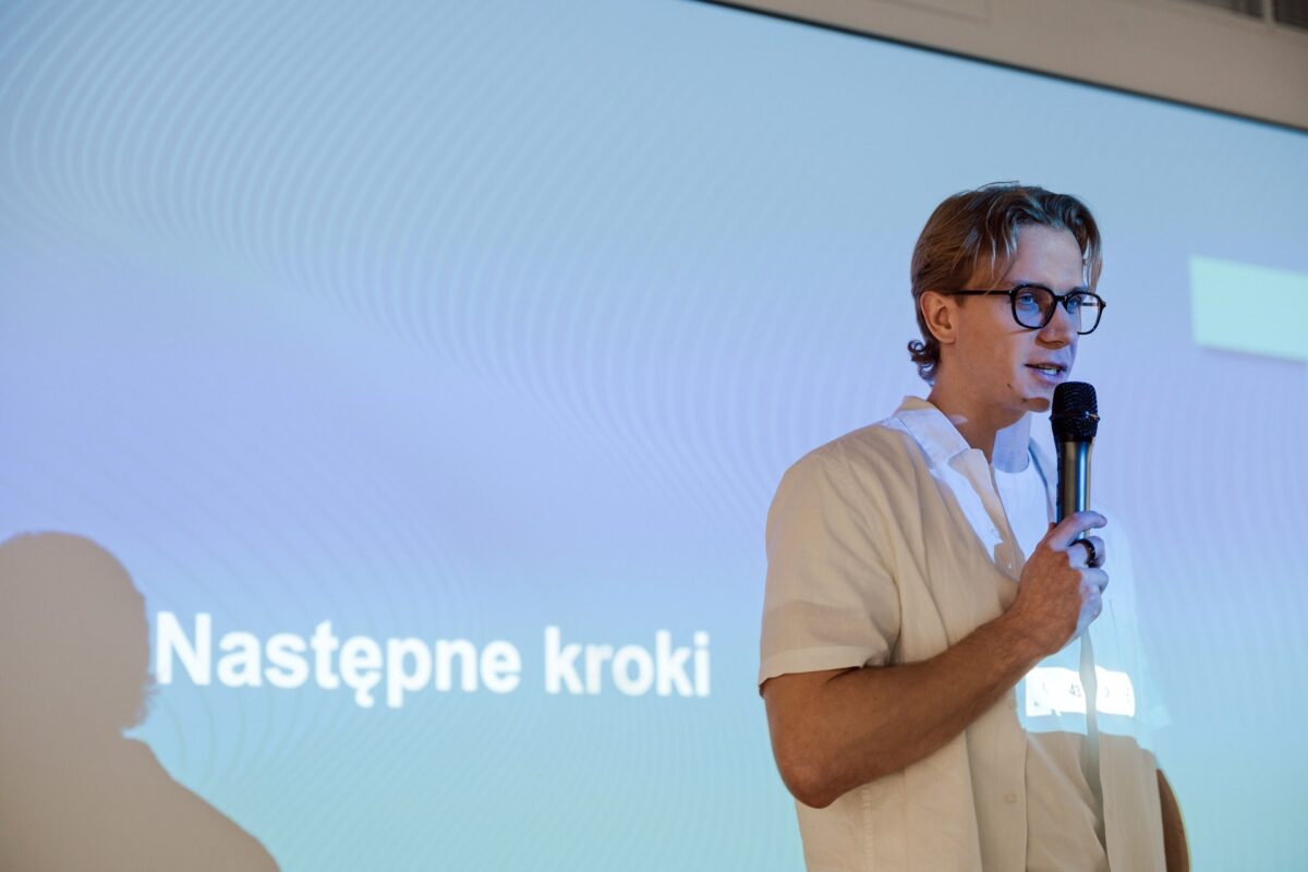 Prelegent podczas wystąpienia na Guidewire Warsaw Pricing Meetup 2026