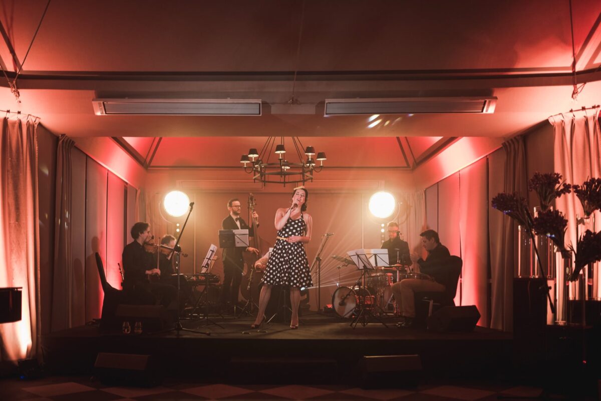 A concert on the stage during a company gala at Belvedere in Łazienki