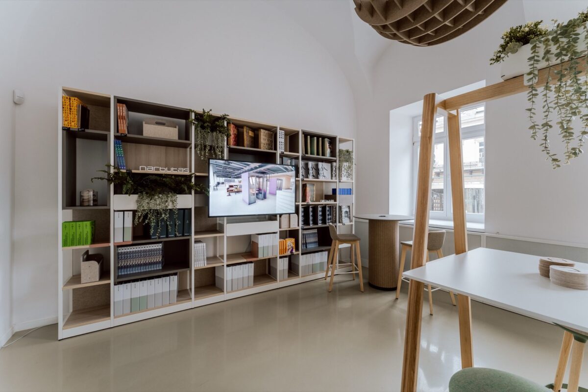 Narbutas shelving with publications and a screen in the ASP showroom space