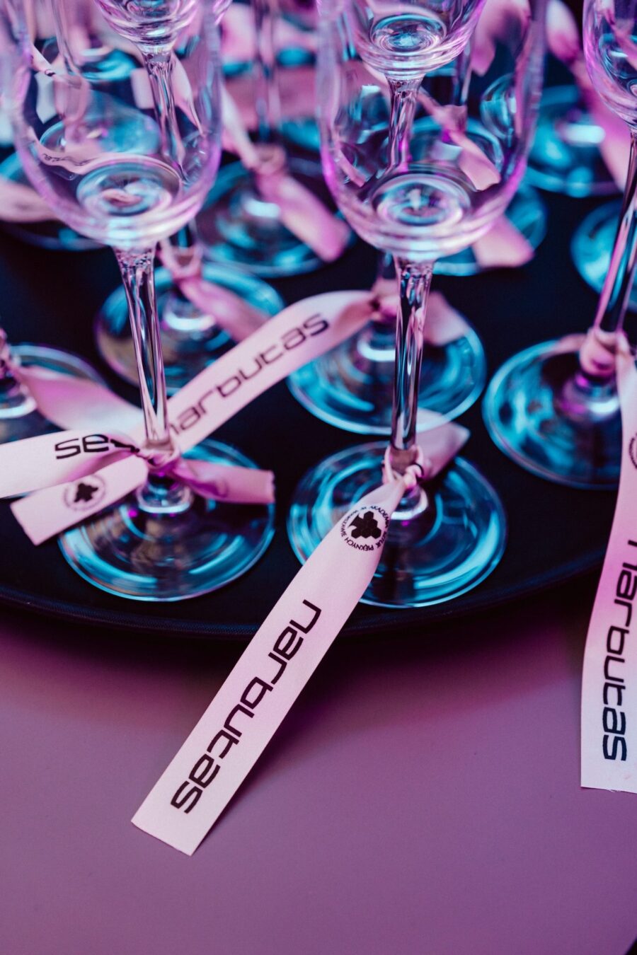Glasses with Narbutas logo tags prepared for the showroom opening