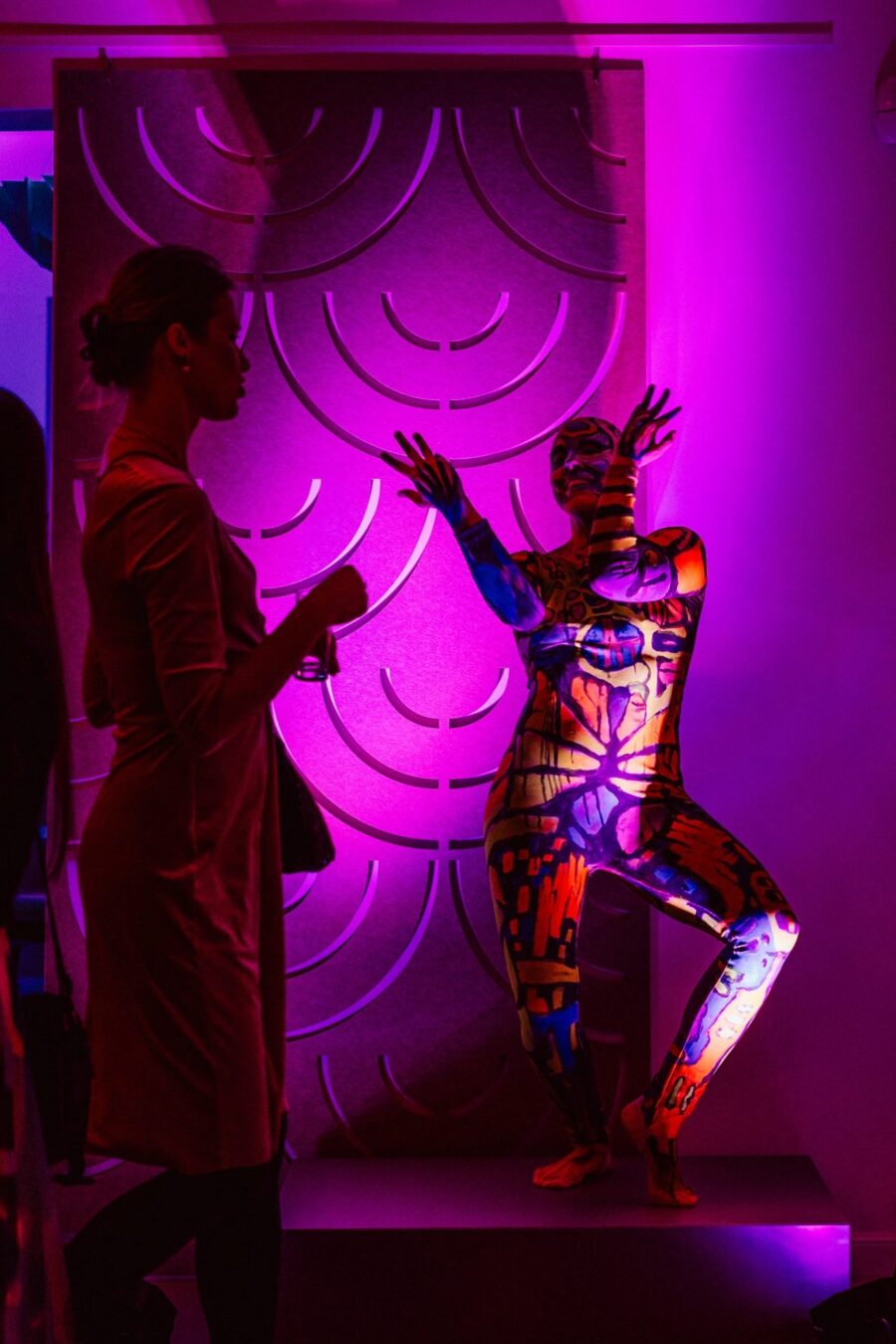 Performance in fluorescent body paint among the guests of the Narbutas opening